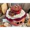 The custom made hat the gourd character is wearing is dark red with white lace trim. Embellishments include real acorns and cedar rosettes.